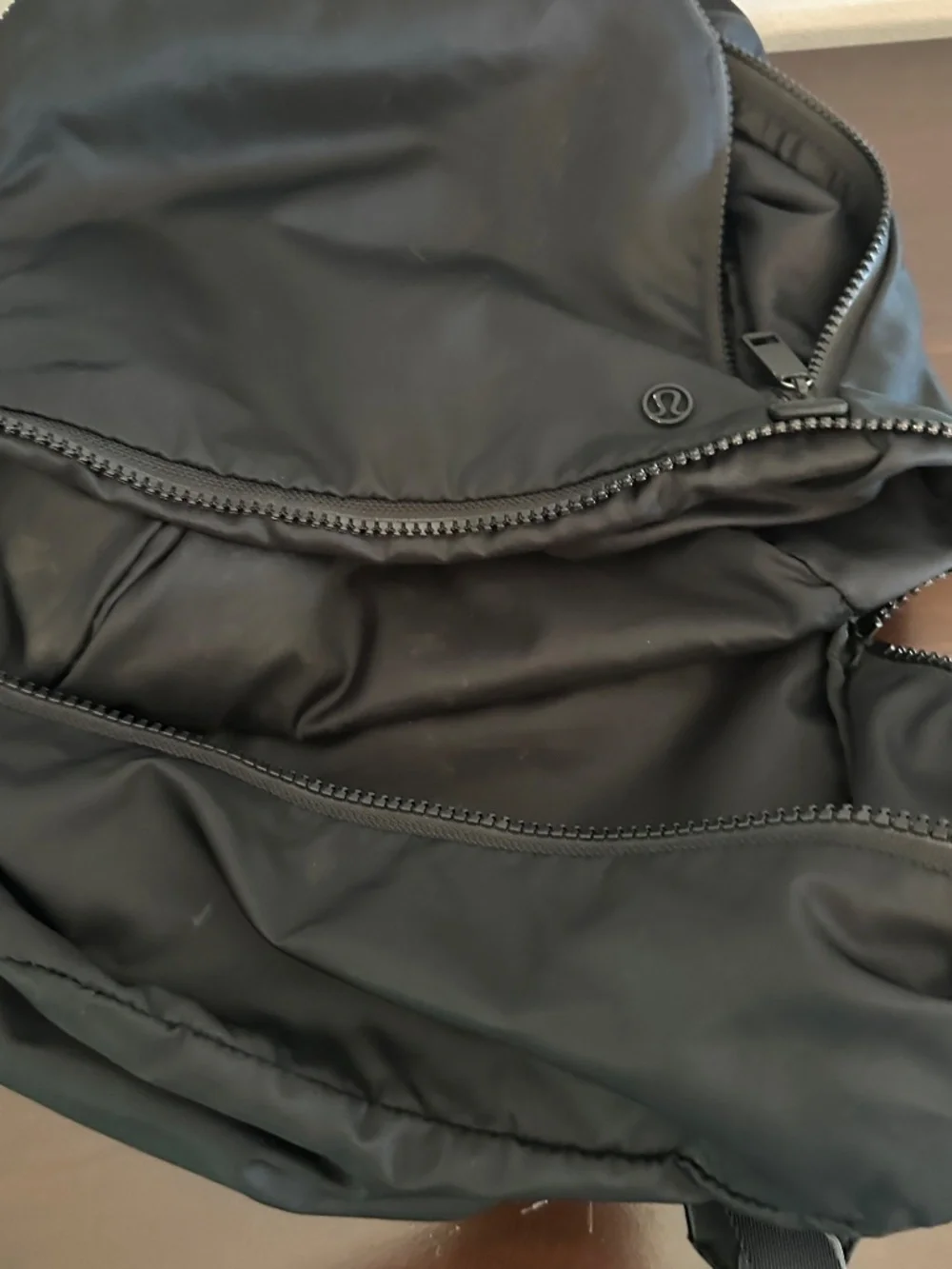 Lululemon Backpack Black On Black Shoulder Straps Zip Close Mesh Compartments